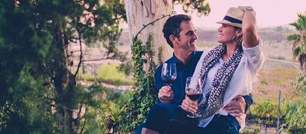 Grapeline founders John and Kim at a winery