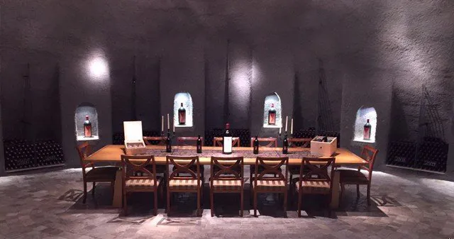 Tablet set for wine tasting in the winery cave of Eberly Winery in Paso Robles, CA