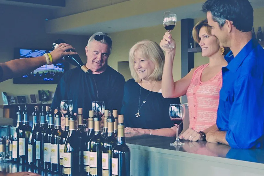 Two couples tasting red wine in Paso Robles